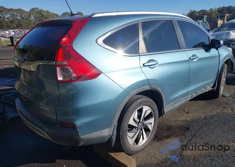 2015 Honda Cr-V Touring z USA, uszkodzony, nr VIN 5J6RM3H97FL026807